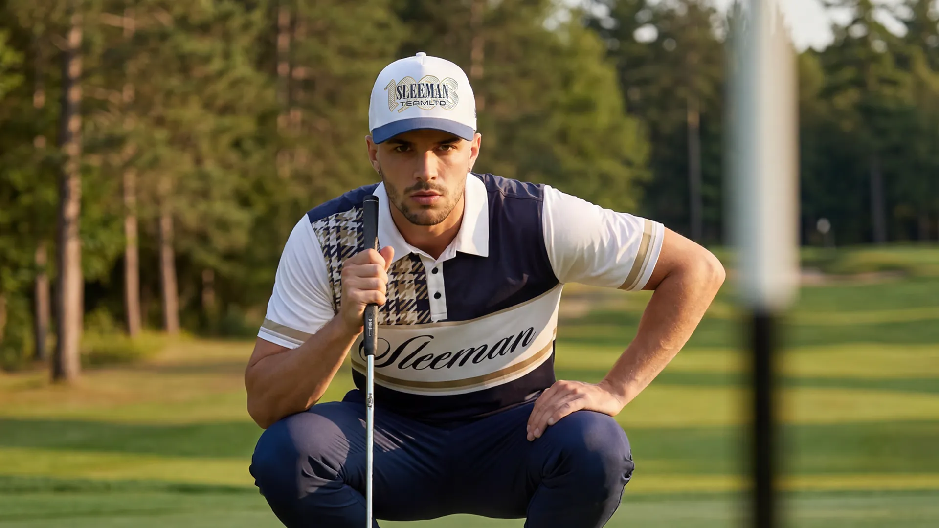 Sleeman x TEAMLTD custom golf apparel, embroidered cap and knit polo on course
