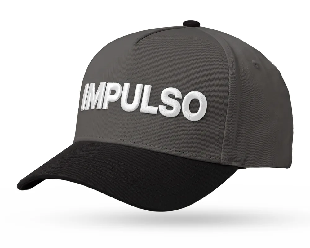 Impulso Media custom 5-panel snapback, charcoal crown, black brim, white 3D embroidered wordmark