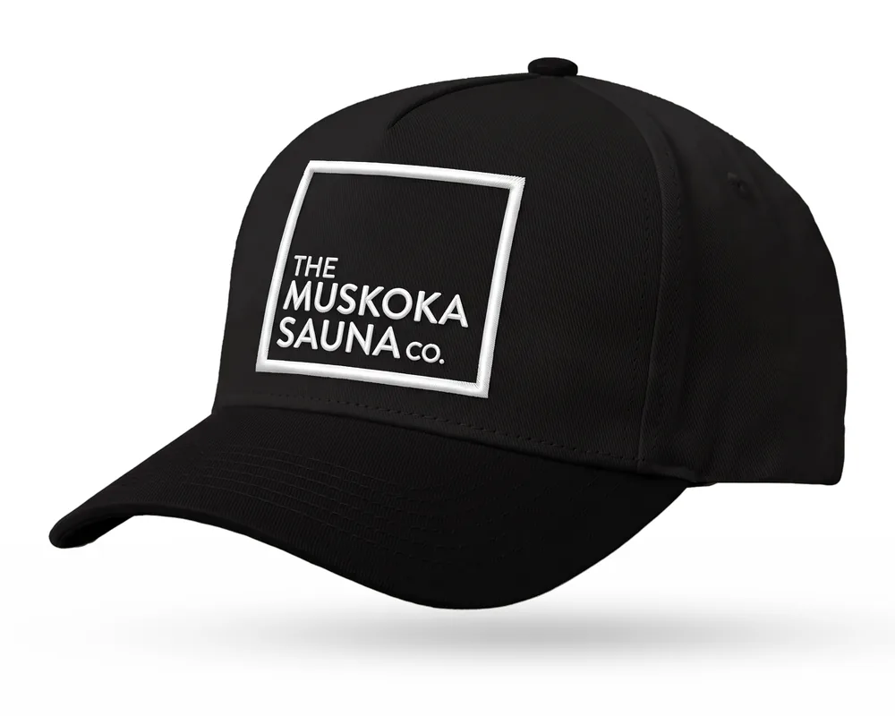 The Muskoka Sauna Co custom 5-panel snapback, all black with a white embroidered square logo