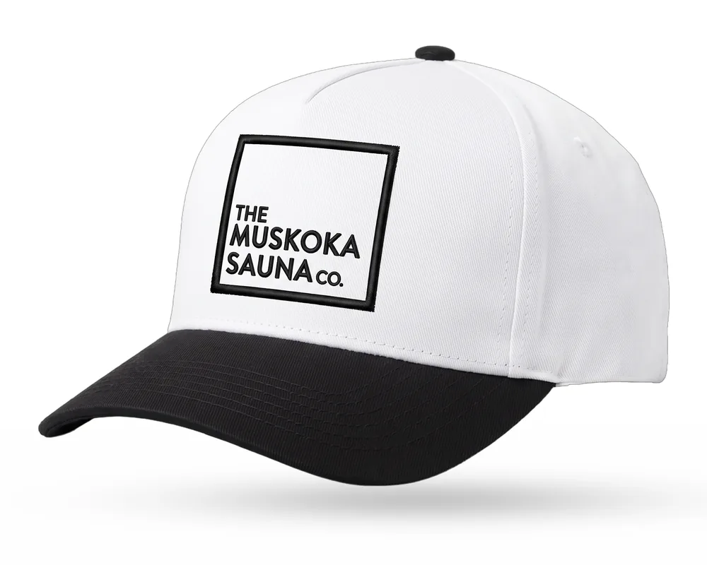 The Muskoka Sauna Co custom 5-panel snapback, white crown, black brim, black embroidered square logo