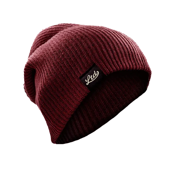 Burgundy slouch beanie with a woven Ltd label